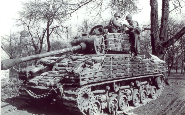 Black and white HD desktop wallpaper of a military M4 Sherman tank with soldiers standing on it in a wooded area.
