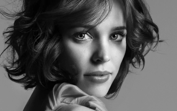 A striking black-and-white portrait of Rachel McAdams, showcasing her expressive features. This image serves as a captivating HD desktop wallpaper and background.