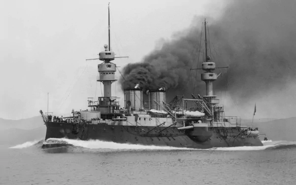 Black and white 4K Ultra HD wallpaper of the French Navy battleship Jauréguiberry steaming with smoke billowing from its funnels.