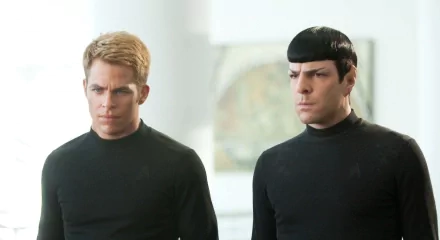 HD PC desktop wallpaper featuring characters from the movie Star Trek Into Darkness, showing two men in black turtlenecks with serious expressions.