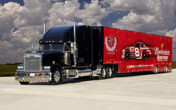 HD desktop wallpaper featuring a Freightliner truck with a black cab and a red Budweiser Racing trailer under a cloudy sky.