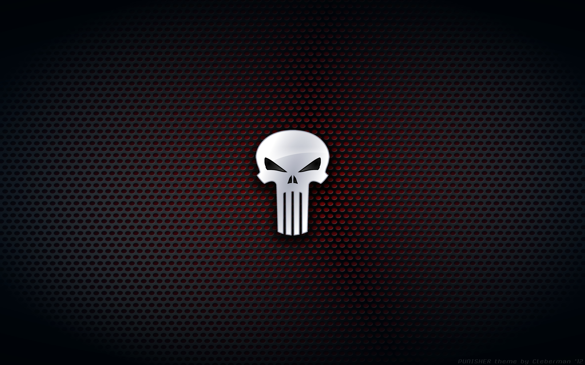 HD PC desktop wallpaper/background: Comic Punisher skull logo centered on a dark perforated metallic surface with a subtle red glow.