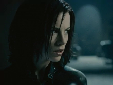 HD PC desktop wallpaper featuring a close-up of a character from the movie Underworld: Evolution in a dark, moody setting.