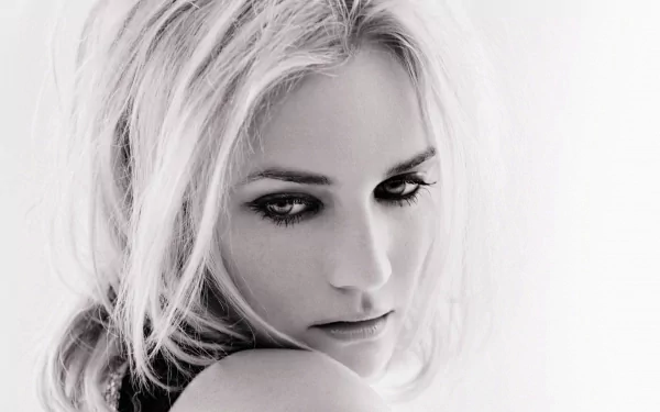 Black and white portrait of celebrity Diane Kruger, showcasing her striking features and intense gaze, designed as a high-definition desktop wallpaper.