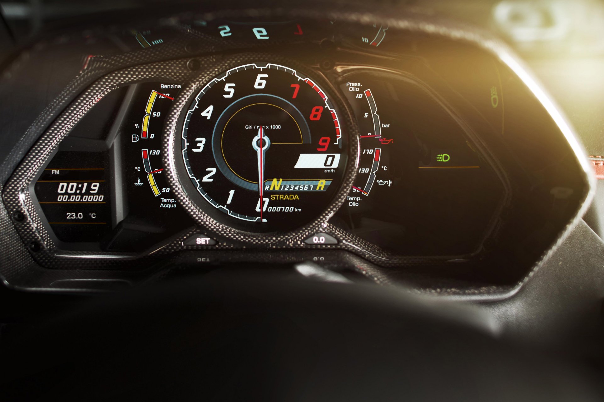Close-up of the dashboard of a Lamborghini Aventador LP 700-4, showcasing the speedometer and various gauges, set against a sleek backdrop for a dynamic HD desktop wallpaper.