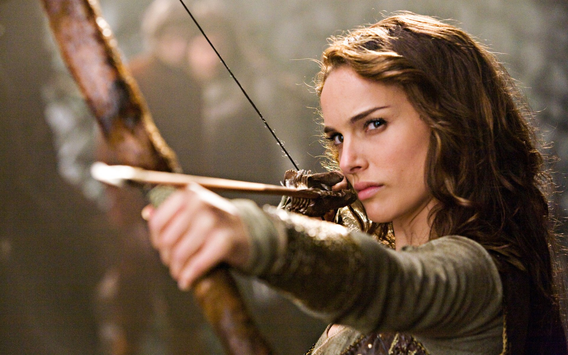 Natalie Portman as a fierce archer in Your Highness, captured in a dynamic moment, showcased in stunning 4K Ultra HD quality for a captivating desktop background.