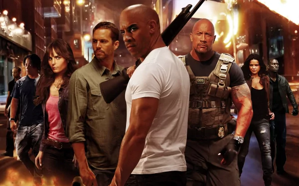 A high-definition desktop wallpaper featuring the main characters from the movie Fast & Furious 6, set against a dynamic, action-packed background.