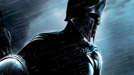 HD desktop wallpaper featuring a dramatic close-up of a warrior in helmet from the movie 300: Rise of an Empire, set against a stormy, rain-soaked background.