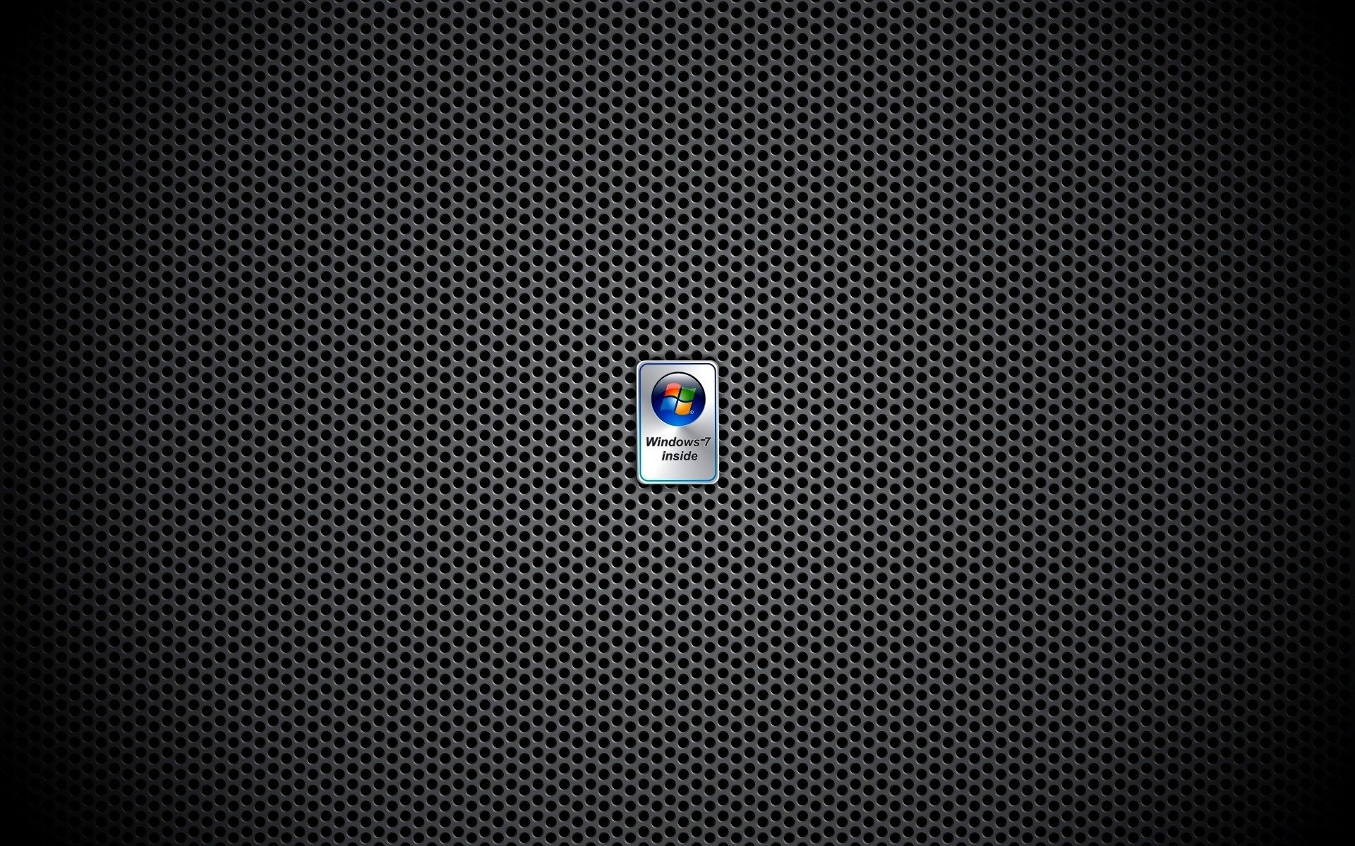 HD desktop wallpaper featuring a dark, textured metallic grid background with a centered Windows 7 logo, highlighting technology and classic PC design.