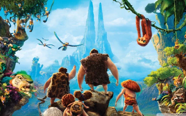 HD PC desktop wallpaper featuring characters from the movie The Croods overlooking a vibrant prehistoric landscape with lush greenery and towering rock formations.