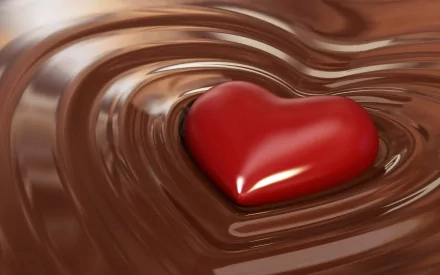 HD desktop wallpaper featuring a red heart-shaped object surrounded by flowing, melted chocolate.