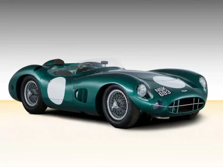 Aston Martin DBR1 race car in British racing green, classic open-top sports vehicle on a neutral gradient — HD PC desktop wallpaper and background.