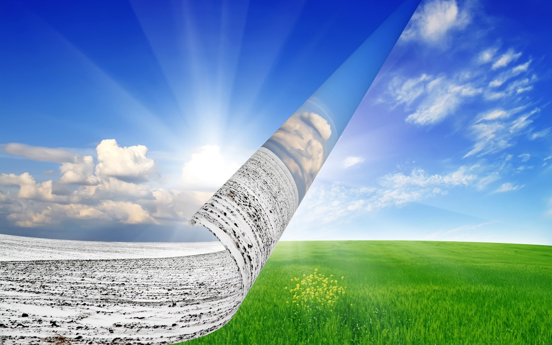 A vibrant HD desktop wallpaper featuring a rolled-up photograph revealing a bright sky and lush green landscape, blending photography and artistic elements seamlessly.
