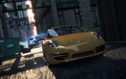 HD PC desktop wallpaper featuring a high-speed chase scene from the video game Need For Speed: Most Wanted with sleek sports cars racing through an urban alley.