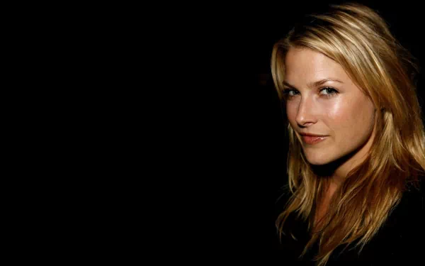 HD PC desktop wallpaper featuring a close-up portrait of celebrity Ali Larter against a black background.