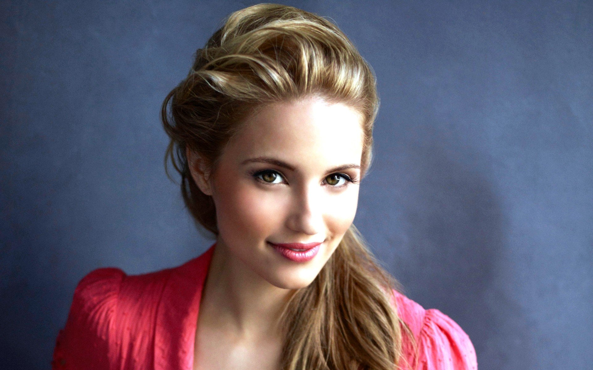 HD PC desktop wallpaper featuring celebrity Dianna Agron with soft lighting and a muted blue background.