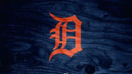 Detroit Tigers logo in bright orange on a textured dark blue wood background, designed as an HD PC desktop wallpaper for sports fans.