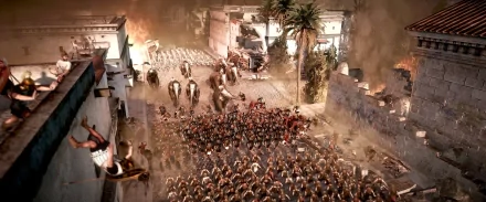 HD PC desktop wallpaper depicting a large army with war elephants advancing through ancient ruins, from the video game Total War: Rome II.