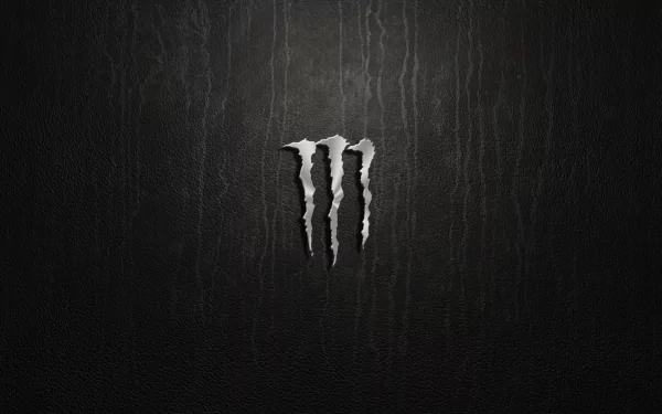 HD PC desktop wallpaper featuring a man-made design of the Monster Energy logo with textured dark background and claw mark emblem.