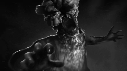 HD PC desktop wallpaper featuring a terrifying Clicker creature from the video game The Last of Us in a dark, intense black-and-white style.