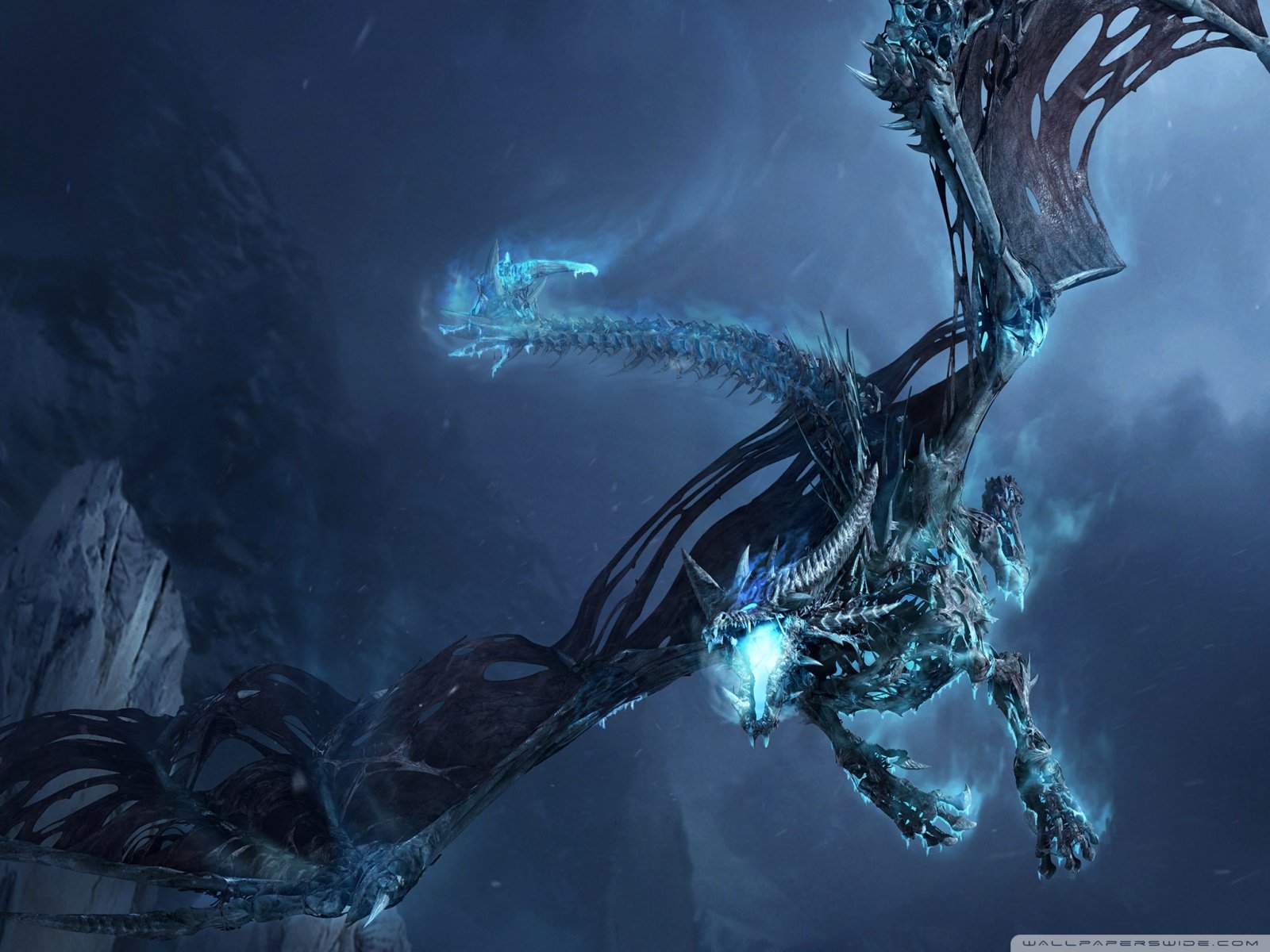 A stunning HD wallpaper featuring a powerful dragon from World of Warcraft, soaring through a mystical, dark landscape, showcasing vibrant blue and icy details.