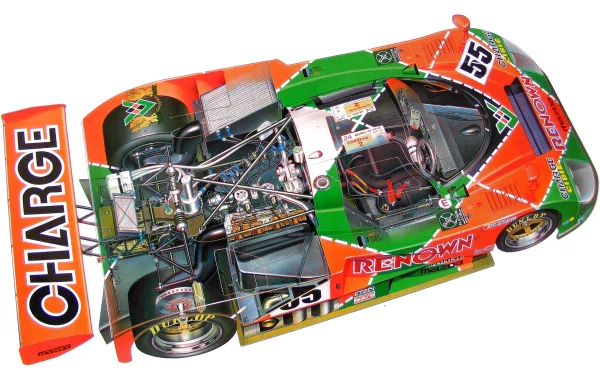 Top-down view of a green-and-orange Mazda 787B race car exposing engine and chassis; 2K Quad HD PC desktop wallpaper and background.