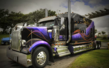 A striking Kenworth truck showcases vibrant purple detailing and chrome accents, set against a scenic backdrop, making it an eye-catching HD PC desktop wallpaper and background.