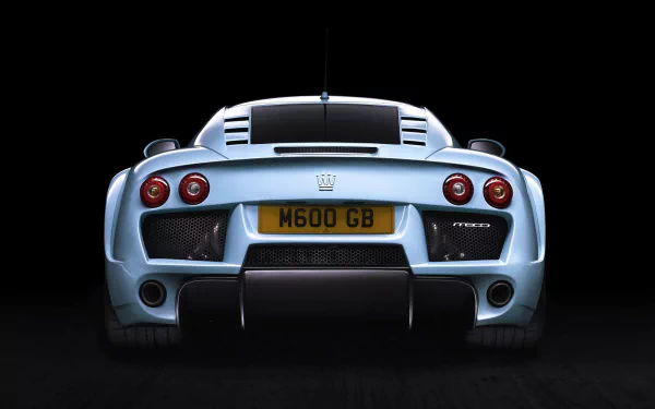 HD PC desktop wallpaper: rear view of a silver Noble M600 sports vehicle against a black background.