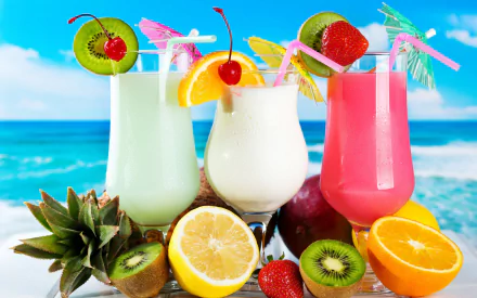HD PC desktop wallpaper of colorful cocktails with fruit garnishes arranged on a beach background, showcasing a vibrant and refreshing food and drink scene.
