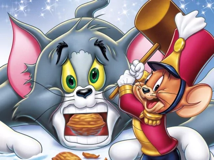 HD desktop wallpaper from the Tom and Jerry TV show featuring Jerry striking Tom's head with a mallet as Tom grimaces, holding a sandwich.