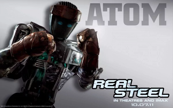 HD desktop wallpaper featuring Atom, the robot from the movie Real Steel, poised for battle against a sleek grey background.