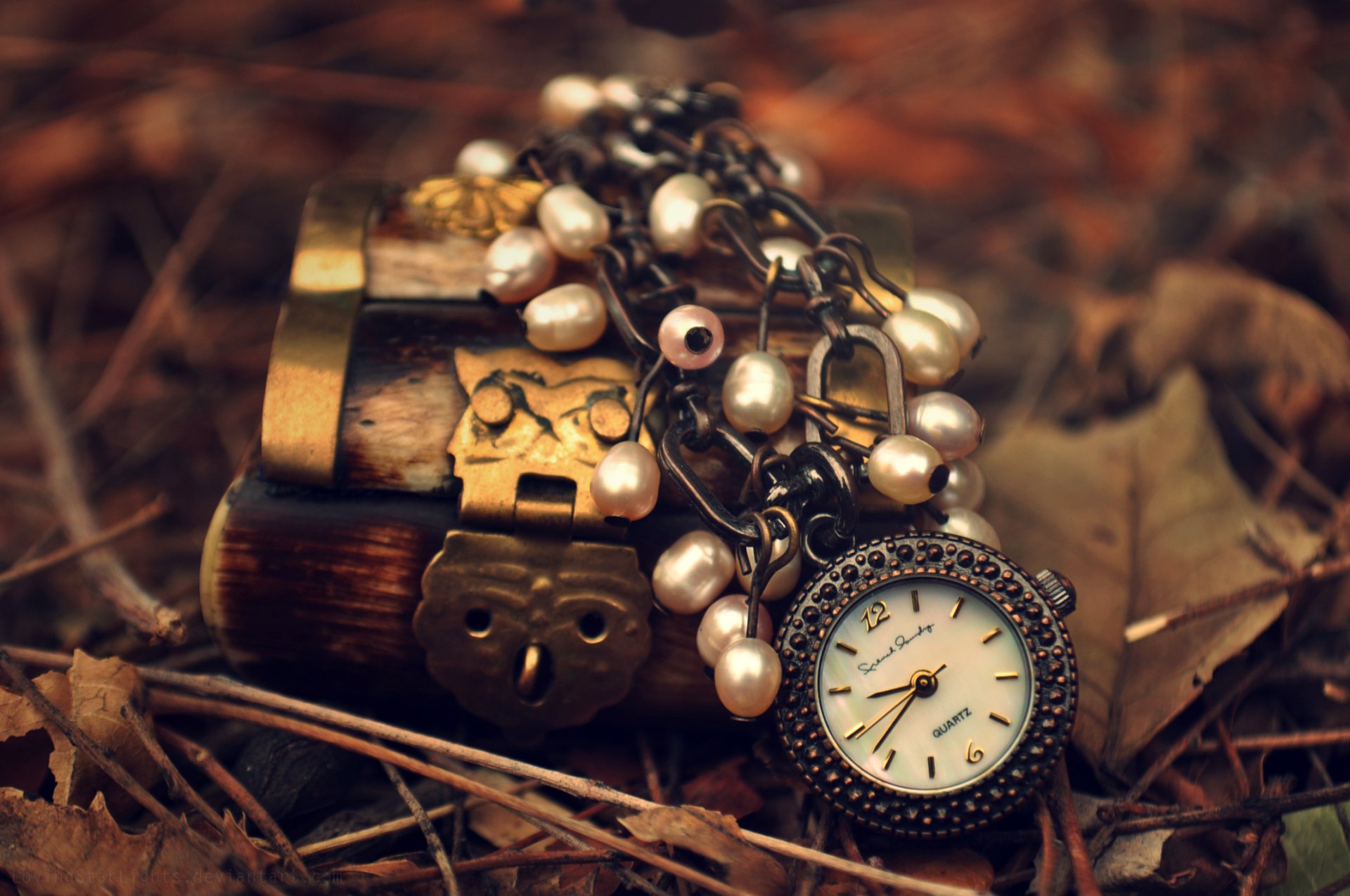 A captivating steampunk still life featuring a vintage watch and a pearl necklace resting on textured, natural elements, creating a rich and intriguing HD desktop wallpaper.