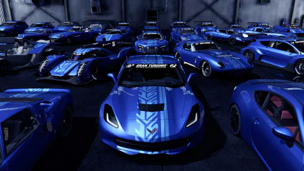 HD PC desktop wallpaper featuring a collection of blue sports cars from the video game Gran Turismo 6, showcasing sleek designs in a dimly lit garage.