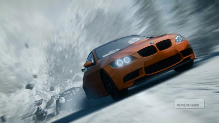 HD PC desktop wallpaper from the video game Need For Speed: The Run featuring an orange sports car drifting sharply on a snowy mountain road.