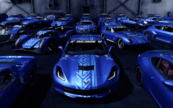 HD PC desktop wallpaper featuring a collection of blue sports cars from the video game Gran Turismo 6, showcasing sleek designs in a dimly lit garage.