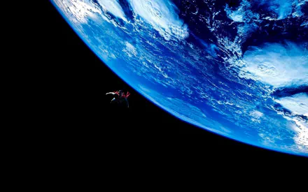 HD desktop wallpaper featuring a scene from Man of Steel with Superman flying above Earth in outer space.