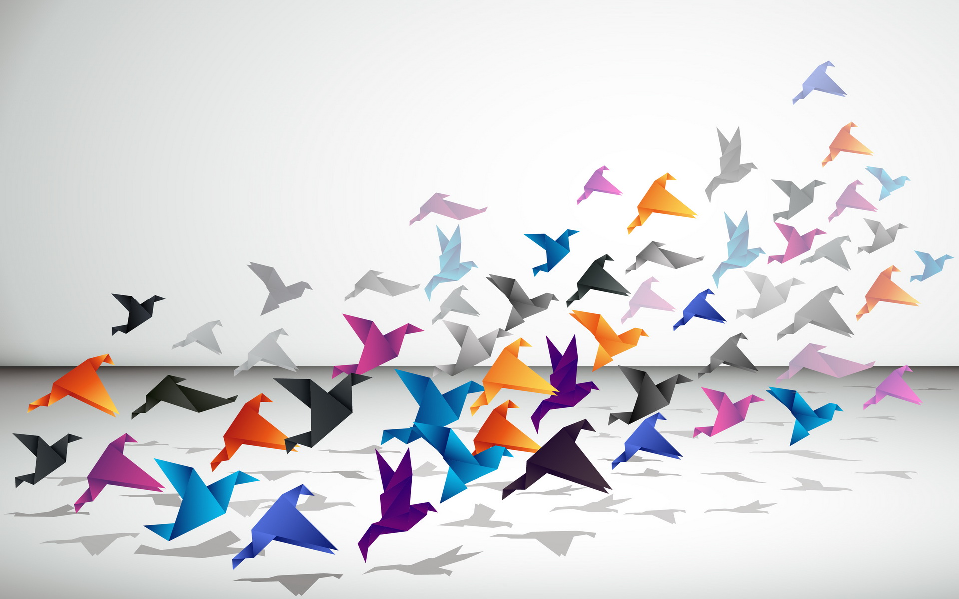 HD desktop wallpaper featuring a dynamic display of colorful origami birds in mid-flight across a clean white background.