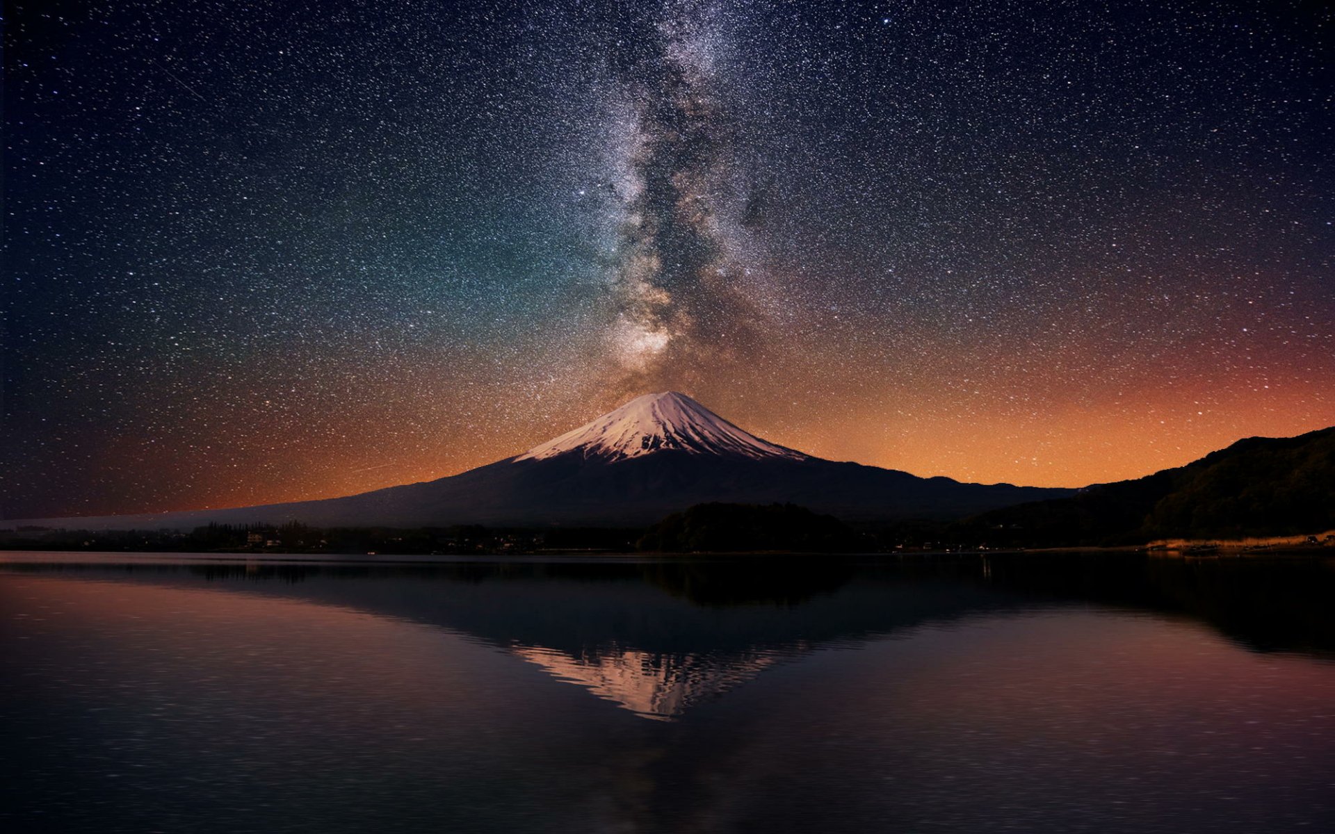 HD wallpaper featuring the Milky Way towering over Mount Fuji in Japan, with a vivid starry sky reflected in a tranquil lake, creating a mesmerizing sci-fi ambiance.