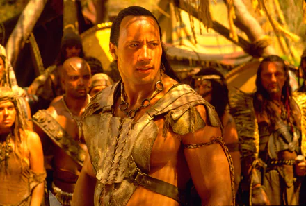Dwayne Johnson as The Scorpion King in a detailed 4K Ultra HD movie scene, surrounded by warriors in a desert setting.
