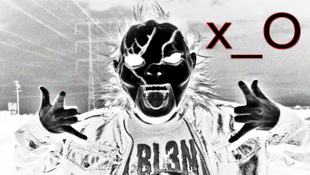 An electrifying HD wallpaper featuring DJ BL3ND, characterized by a bold, inverted image with a mischievous expression, embodying the energy of dubstep and electro house music.