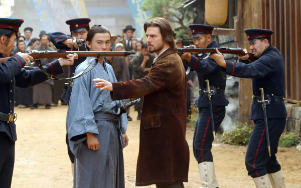 A dramatic scene from The Last Samurai, featuring intense standoffs between armed soldiers and samurai, set against a historical backdrop. High-definition wallpaper captures the tension.
