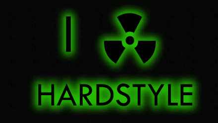 HD PC desktop wallpaper featuring glowing green text and symbols that read I [radioactive symbol] HARDSTYLE, highlighting a hardstyle music theme.