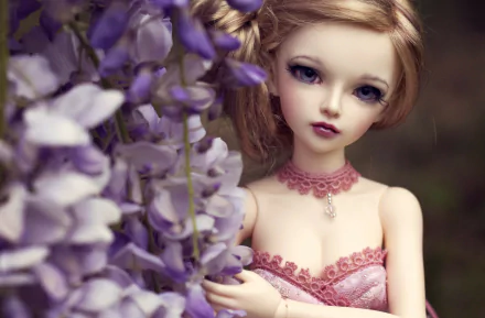 A detailed man-made doll with realistic features stands beside purple flowers in this HD PC desktop wallpaper and background.