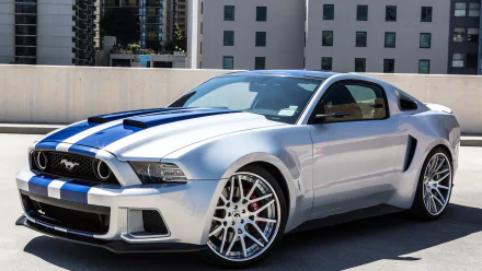 A sleek Ford Mustang Shelby in silver, featuring striking blue racing stripes and stylish wheels, showcased as a high-definition desktop wallpaper.