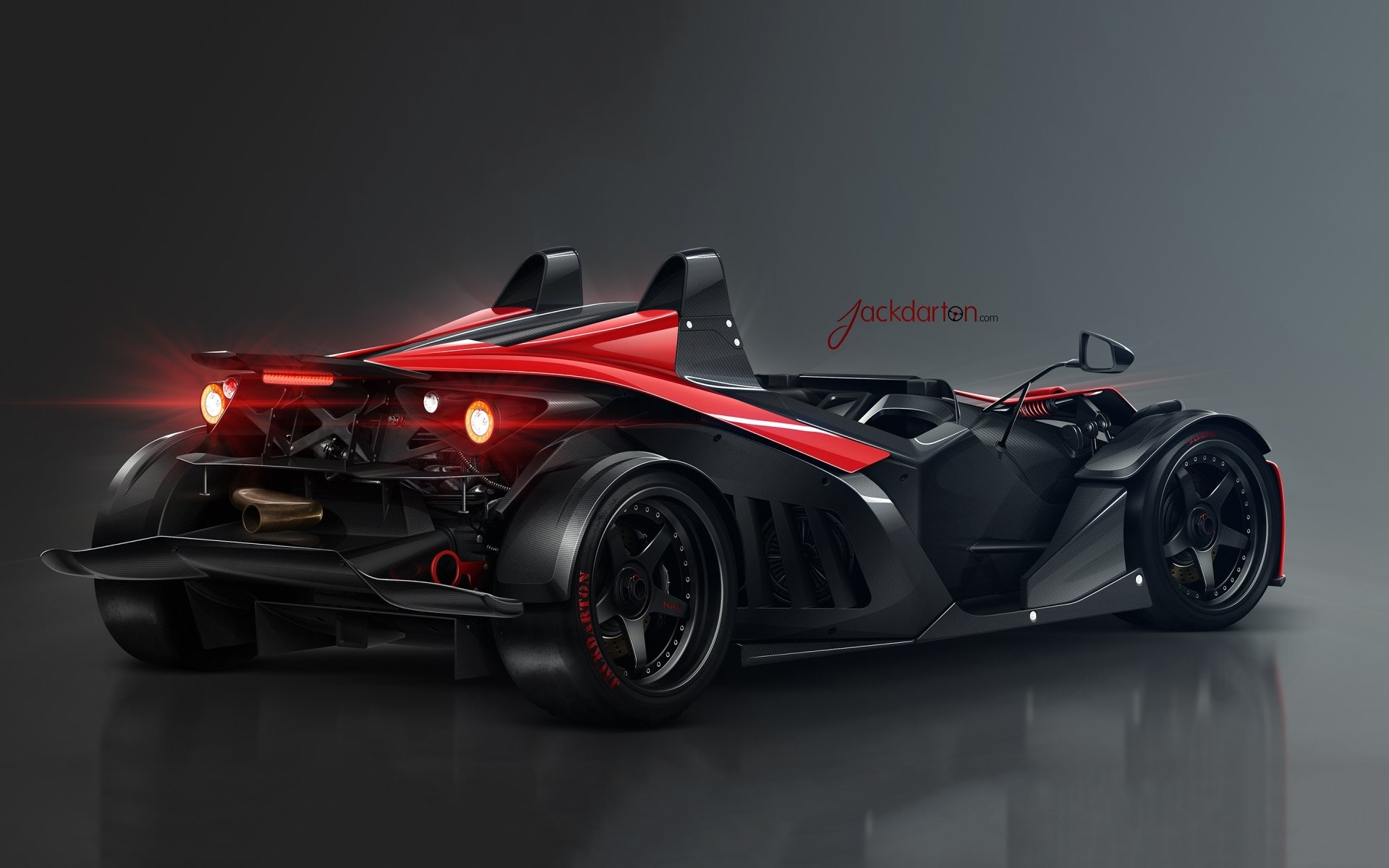 HD PC desktop wallpaper featuring a sleek black and red KTM X-Bow vehicle showcased against a dark gradient background.