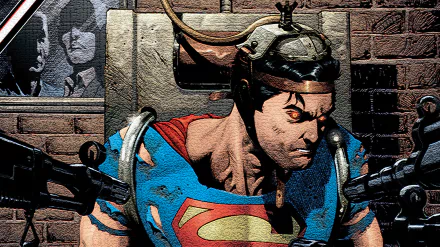 HD comic-style PC desktop wallpaper/background showing Superman in a torn suit and cape, wearing a restraining mechanical helmet and held by heavy weapons against a gritty brick wall.