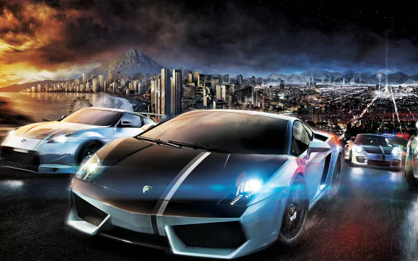 HD PC desktop wallpaper featuring high-speed sports cars racing through a cityscape at night from the video game Need For Speed.