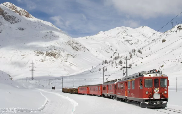 A red RhB train travels through snowy Swiss mountains under a cloudy sky, captured in HD for a PC desktop wallpaper and background.