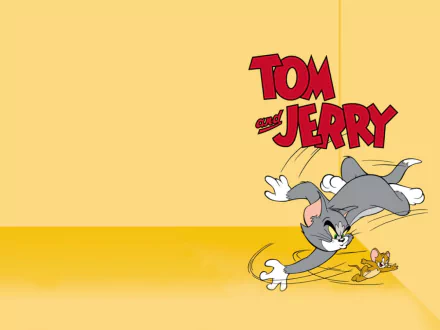 HD desktop wallpaper featuring Tom and Jerry, with Tom chasing Jerry against a vibrant yellow background. A fun and nostalgic tribute to the classic TV show.