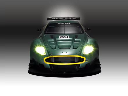 Front view of green Aston Martin DBR9 race vehicle with headlights ablaze and number 59, rendered as an HD PC desktop wallpaper and background.